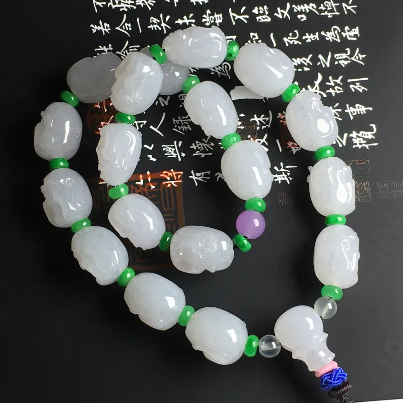 笑佛手持链 裸石尺寸17-12-11毫米 玉质水润 雕工精美 配珠为装饰品