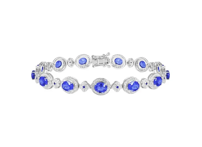 【18k金镶矢车菊蓝宝石手链 宝石参数:5.55+0.08ct 配石:钻石356颗,总重8.23克,链长:17cm】图4