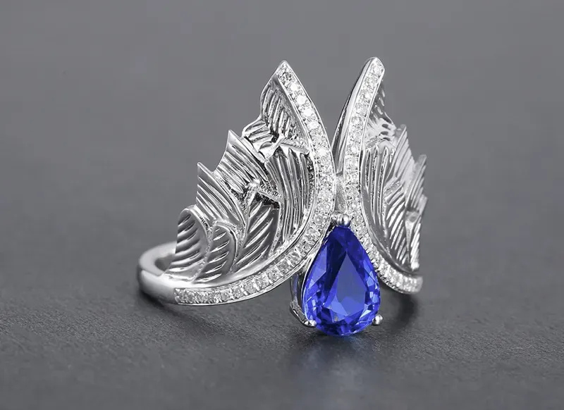 【18k金镶矢车菊蓝宝石戒指 宝石参数:1.22ct 配石:钻石50颗,总重4.48克,圈口:13.5号(可改圈)】图1