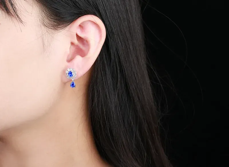 【18k金镶蓝宝石耳钉 宝石参数:2.3ct 配石:白蓝宝22颗,总重2.72克】图3