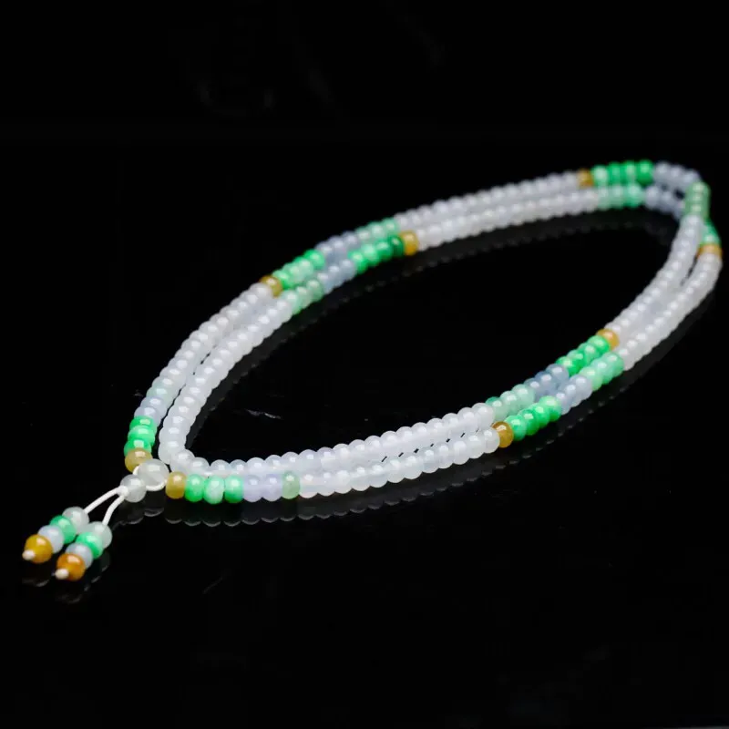 多彩翡翠珠链，共101颗珠子，取其中一颗珠尺寸大约5.6*3.4mm，莹润光泽，清秀高雅，佩戴效果高贵漂亮！