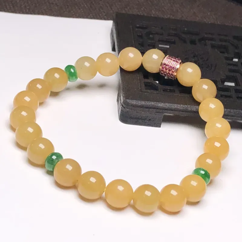 糯种黄翡翠珠链手串、直径7.8毫米、质地细腻、色彩鲜艳、隔珠是装饰品、A238AN