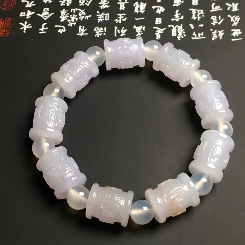 糯化种六字真言路路通手串 9颗 质地细腻 雕工精湛 款式时尚 隔珠为装饰品
