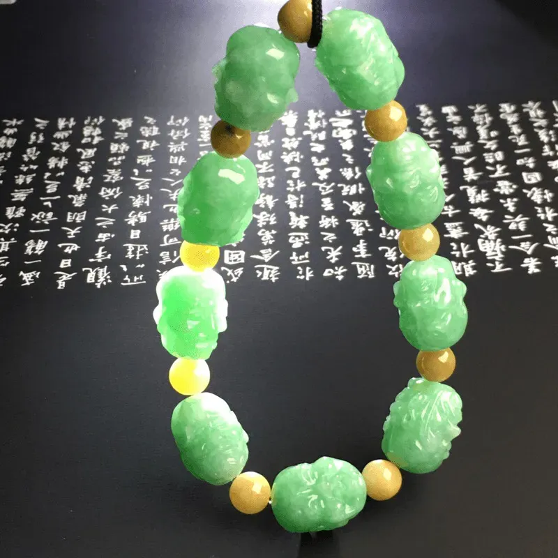 糯化种满色【罗汉】手串 9颗 质地细腻 雕工精湛 色彩艳丽 隔珠为黄翡翡翠