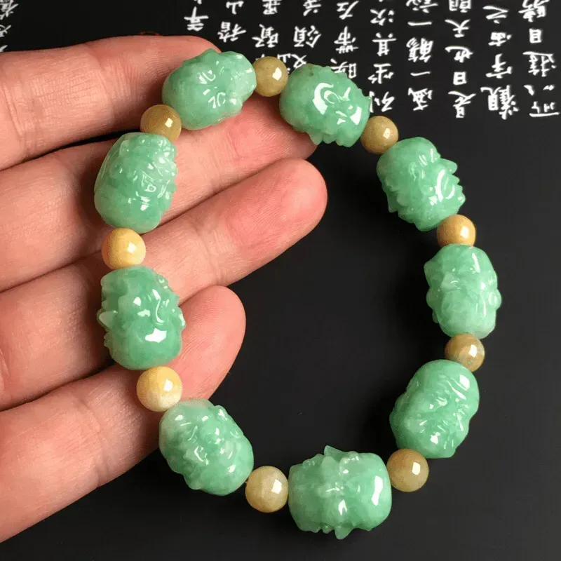 糯化种满色【罗汉】手串 9颗 质地细腻 雕工精湛 色彩艳丽 隔珠为黄翡翡翠