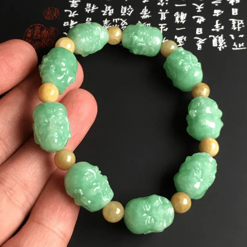 糯化种满色【罗汉】手串 9颗 质地细腻 雕工精湛 色彩艳丽 隔珠为黄翡翡翠