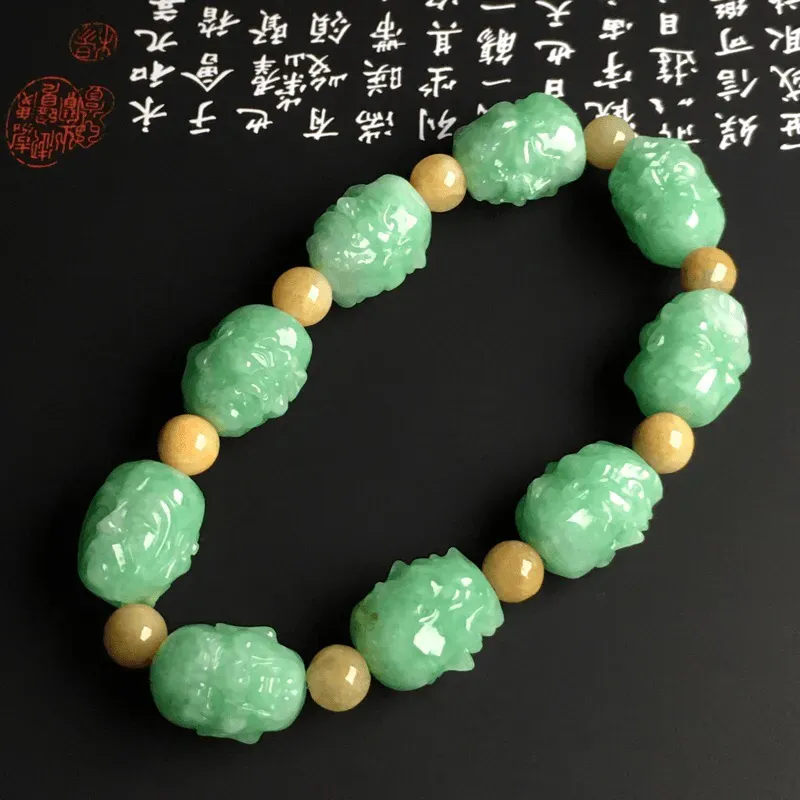 糯化种满色【罗汉】手串 9颗 质地细腻 雕工精湛 色彩艳丽 隔珠为黄翡翡翠