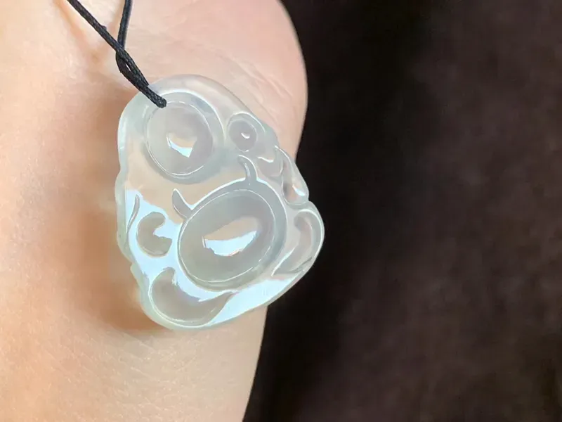 冰种逍遥佛

尺寸27.5-25.2-5.5mm

通透亮丽 美观时尚
