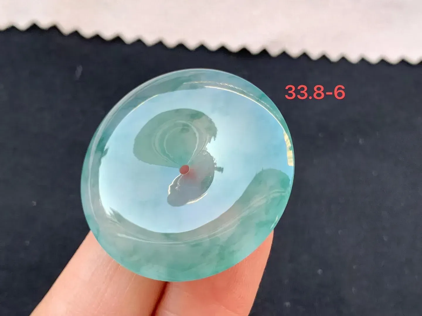 飘蓝花平安扣

尺寸33.8-6mm