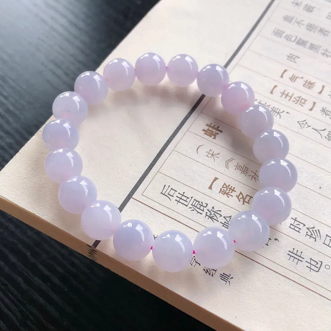 【宝贝】天然翡翠冰润淡紫圆珠手串
【尺寸】直径10（㎜）19颗
【描述】冰糯种，淡紫罗兰，色泽迷人，