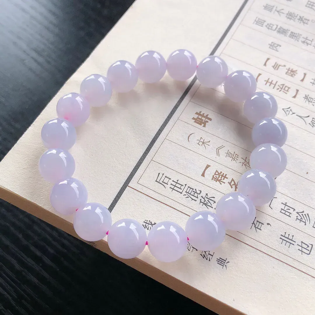 【宝贝】天然翡翠冰润淡紫圆珠手串
【尺寸】直径10（㎜）19颗
【描述】冰糯种，淡紫罗兰，色泽迷人，无纹裂