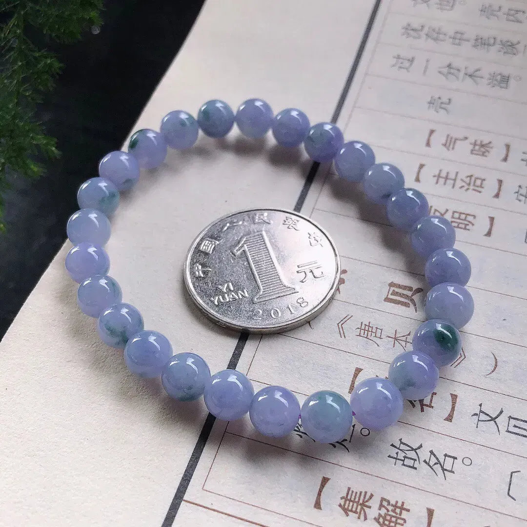 【宝贝】天然翡翠冰紫飘花圆珠手串
【尺寸】直径7（㎜）26颗
【描述】冰糯种，紫罗兰，飘花，色泽迷人，个别轻纹