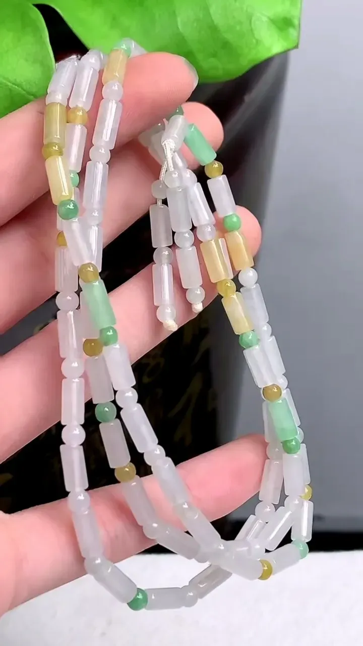 老坑全胶感双彩路路通项链，尺寸:7.5-3.6mm，2023年9月24日
工厂直销收藏佳品,种好水足，色泽均匀，有种有色，上手高大气！重量:22.73g H