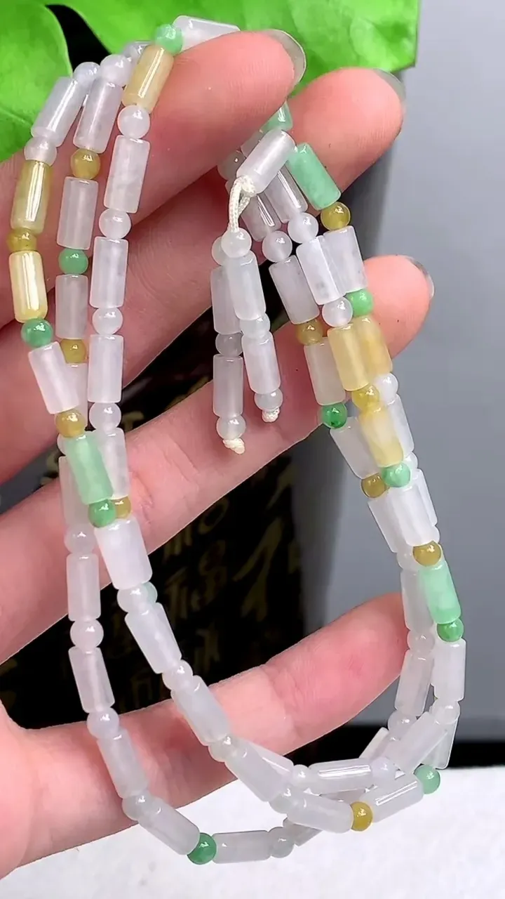 老坑全胶感双彩路路通项链，尺寸:7.5-3.6mm，2023年9月24日
工厂直销收藏佳品,种好水足，色泽均匀，有种有色，上手高大气！重量:22.73g H