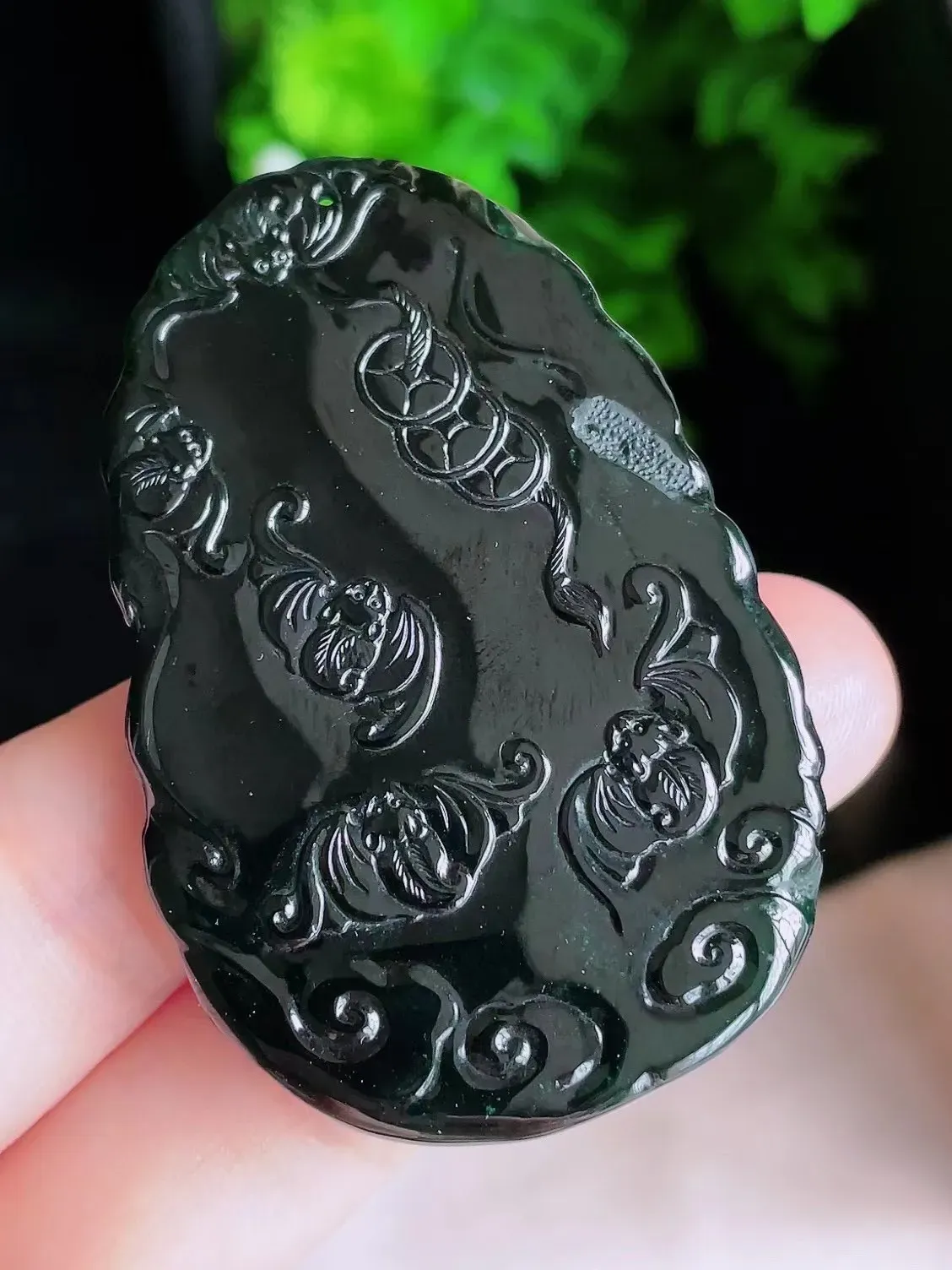 冰满胶墨翠天师钟馗
尺寸58.3/38.3/5.3mm，H23es