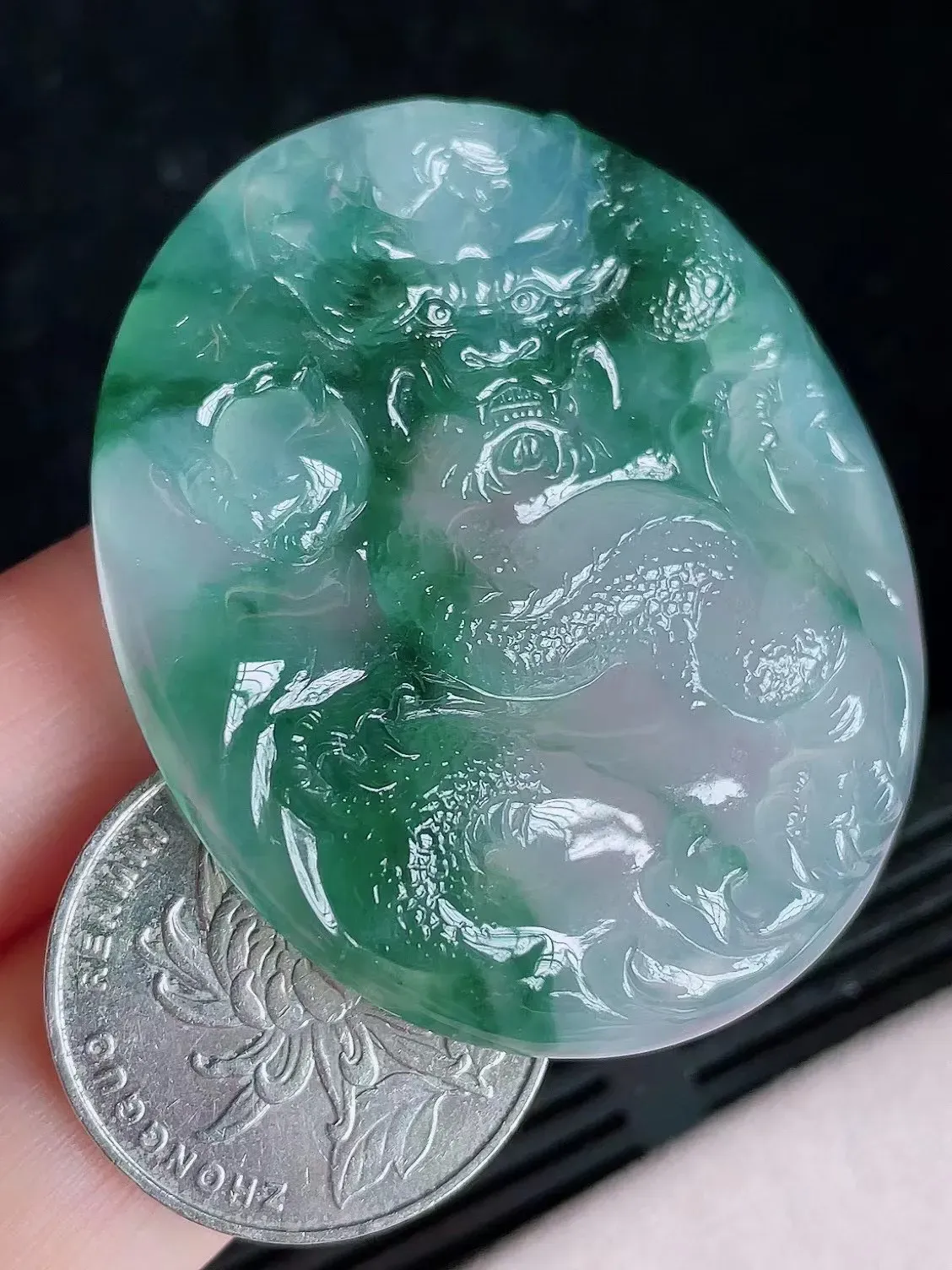 高冰飘花透光龙牌
尺寸50.8/42.6/6.2mm，H31j（纯自然光实拍）
