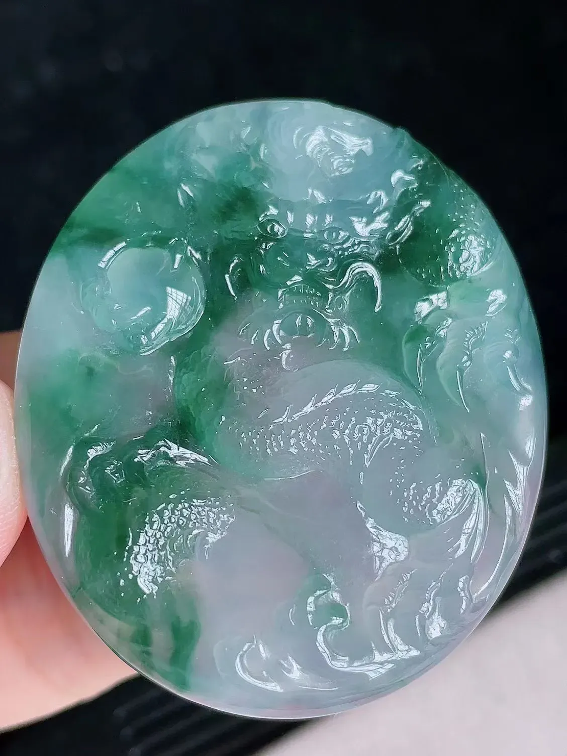 高冰飘花透光龙牌
尺寸50.8/42.6/6.2mm，H31j（纯自然光实拍）