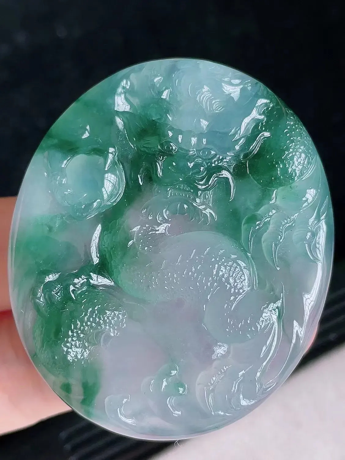 高冰飘花透光龙牌
尺寸50.8/42.6/6.2mm，H31j（纯自然光实拍）