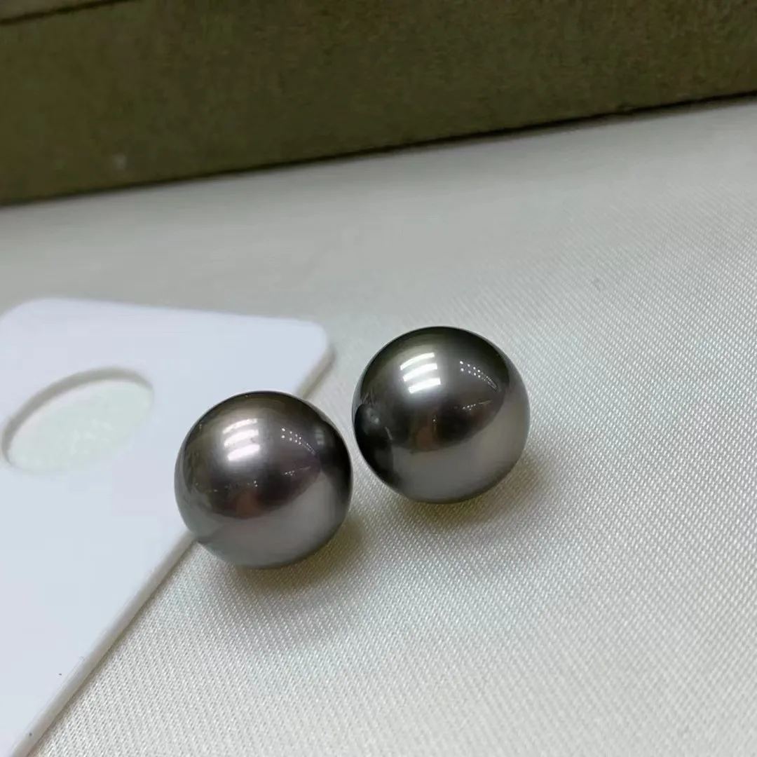 大溪地天然色灰绿光11.5mm对珠！正圆强光无暇！镜面光泽清晰！黑珍珠好品质的很少～同款随机发