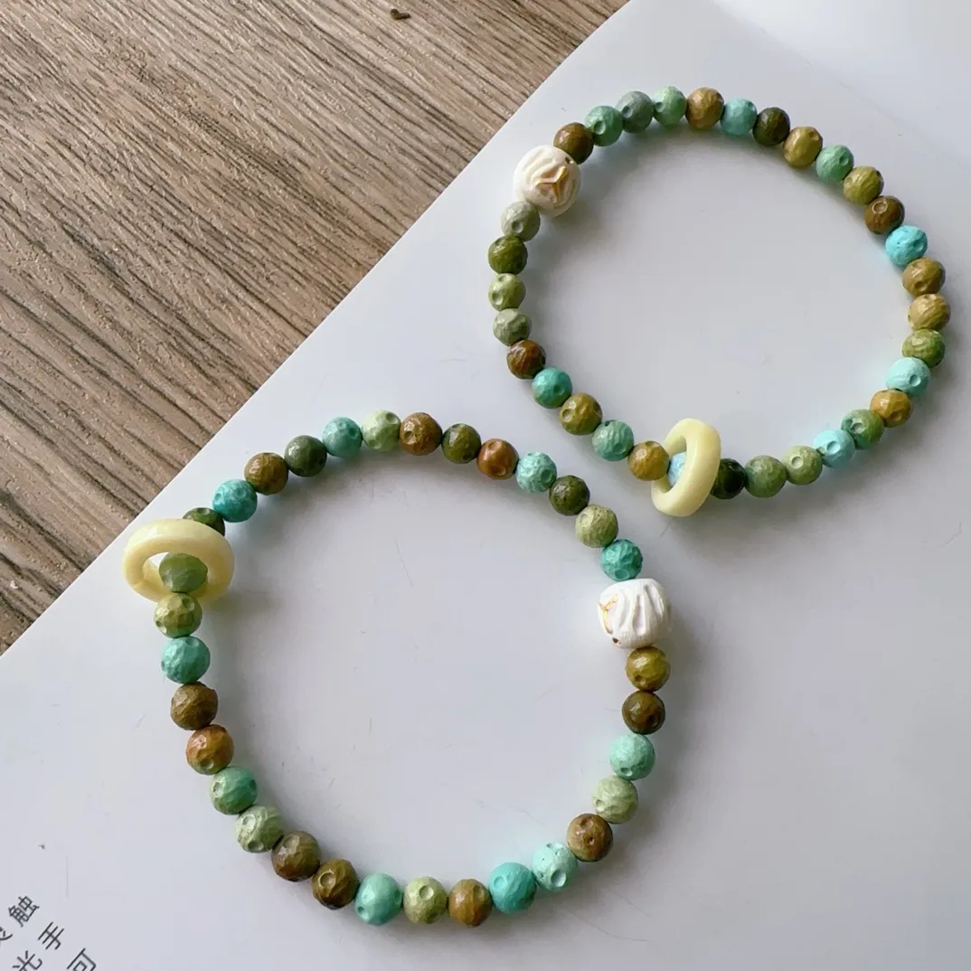 糖果色天然绿松石手链 绿松石星球珠多宝手链，高瓷彩色星球珠，搭配蜜蜡跑环，猛犸牙，规格5.6mm，一件价，同款随机发！