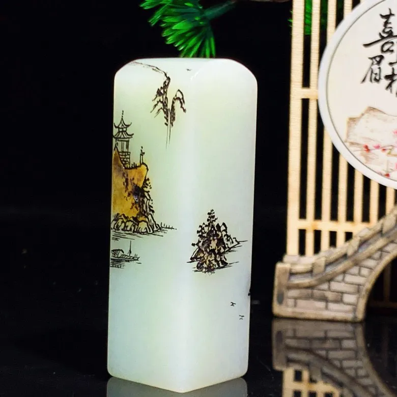 新疆山料山水怡情印章。尺寸62/20/20重70.6克。玉质细腻油润。手推出油。品相大气 lt250331