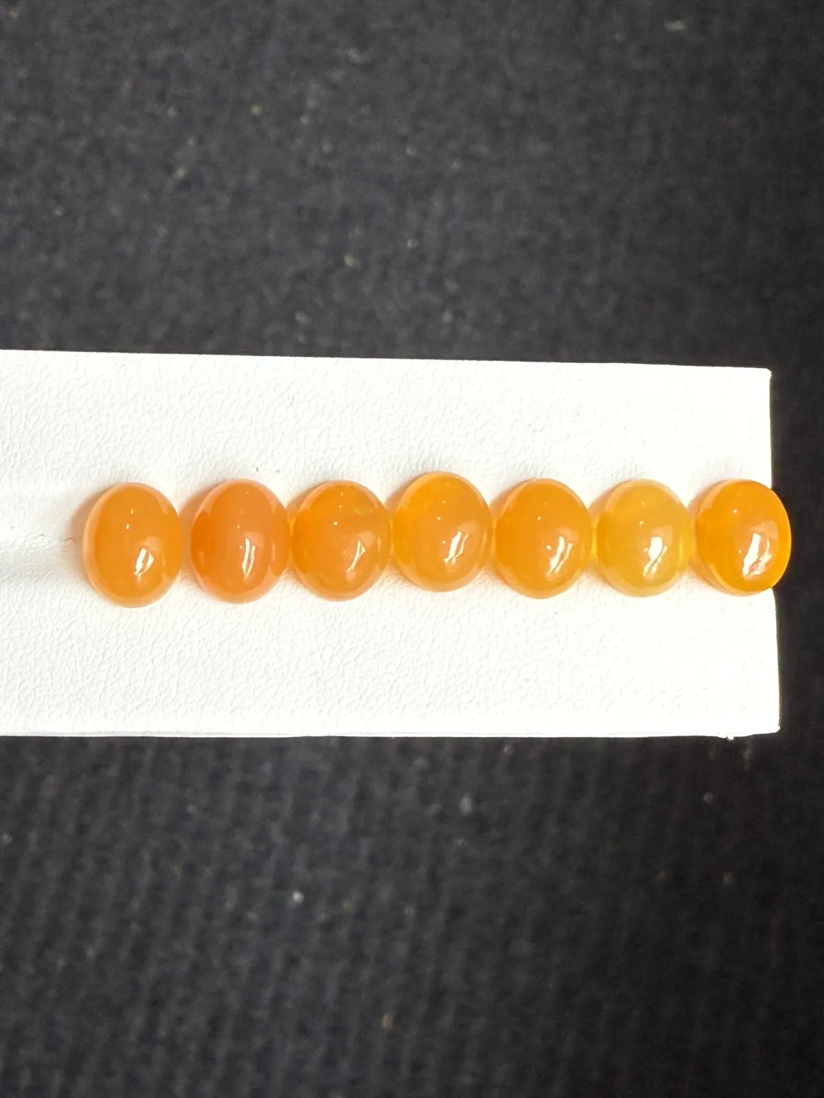 12.94ct天然墨西哥火欧泊裸石 手链料  颜色美艳 ，晶体通透，尺寸9.9×8×4.1mm