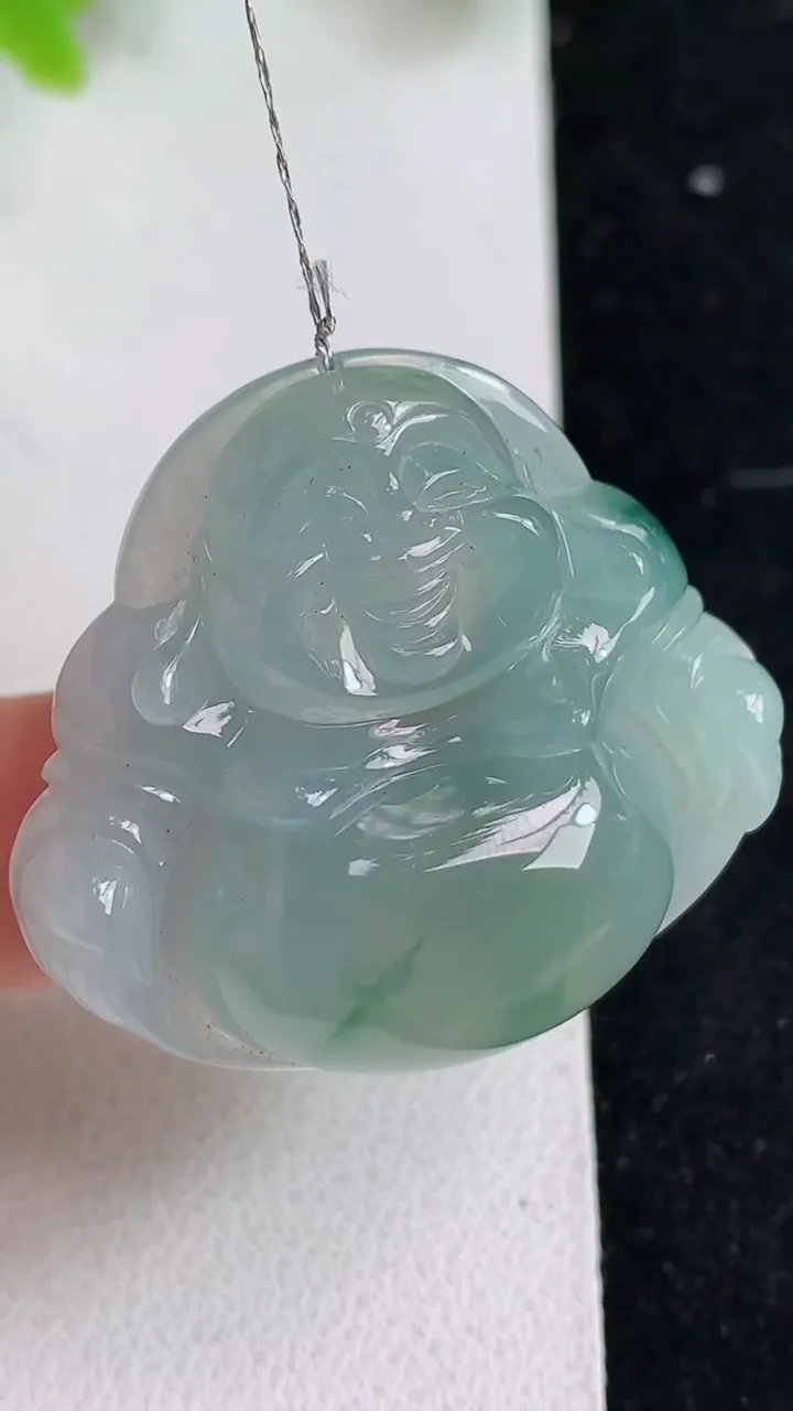 天然A货翡翠飘花佛公吊坠，尺寸32.5-35.7-9，重量:15.00g
5月9日