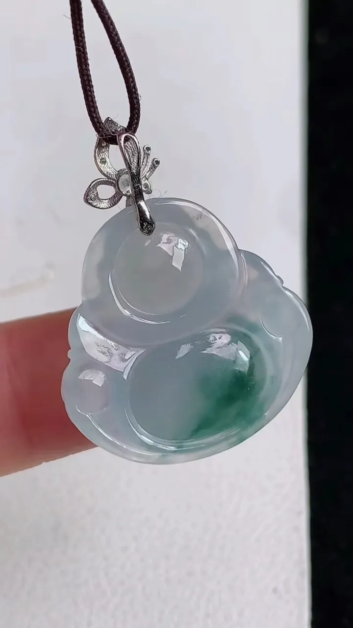 天然A货翡翠飘花佛公吊坠，尺寸21.4-22.2-6，重量:4.39g
5月11日