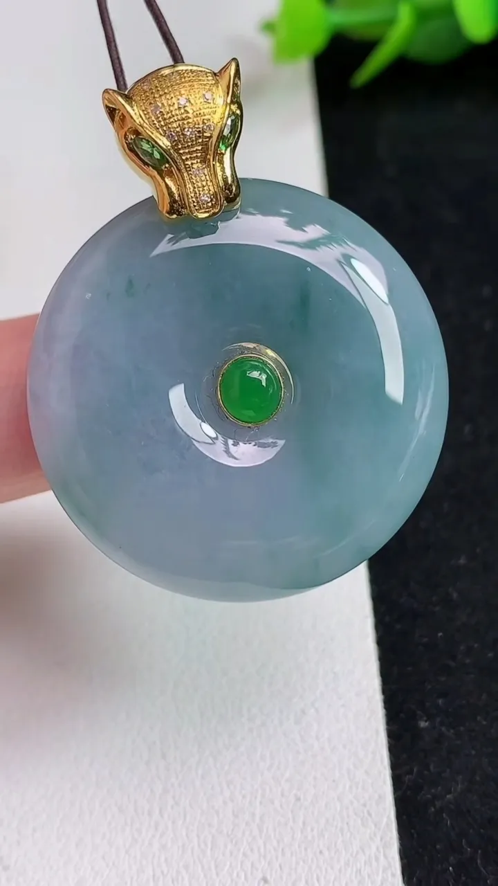 天然A货翡翠k金紫罗兰 飘花平安扣吊坠，尺寸32.4-7.4，重量:18.35g
5月17日
