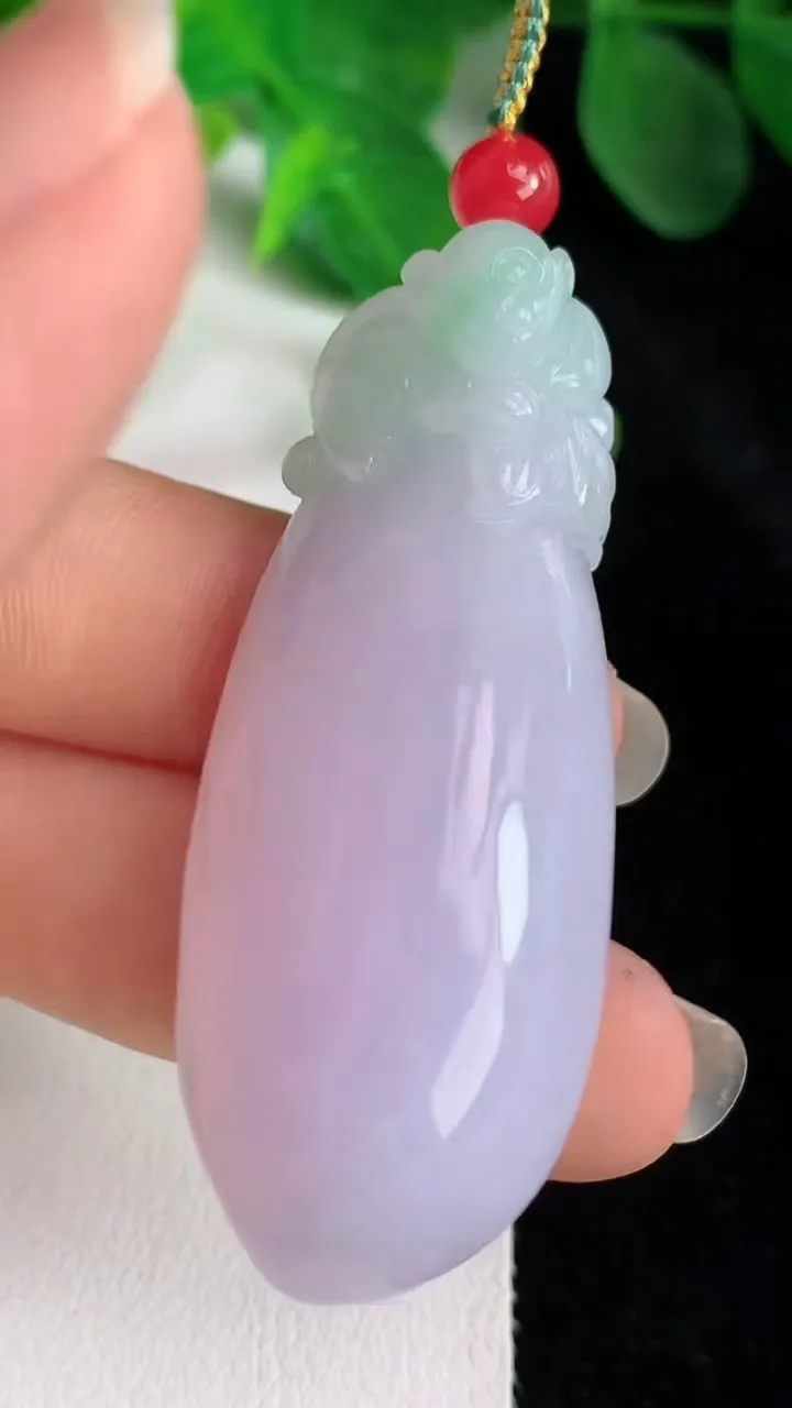 天然A货翡翠春带彩 紫罗兰灵猴献瑞 福瓜吊坠，尺寸53.8-21.2-12，重量:24.18g
5月24日