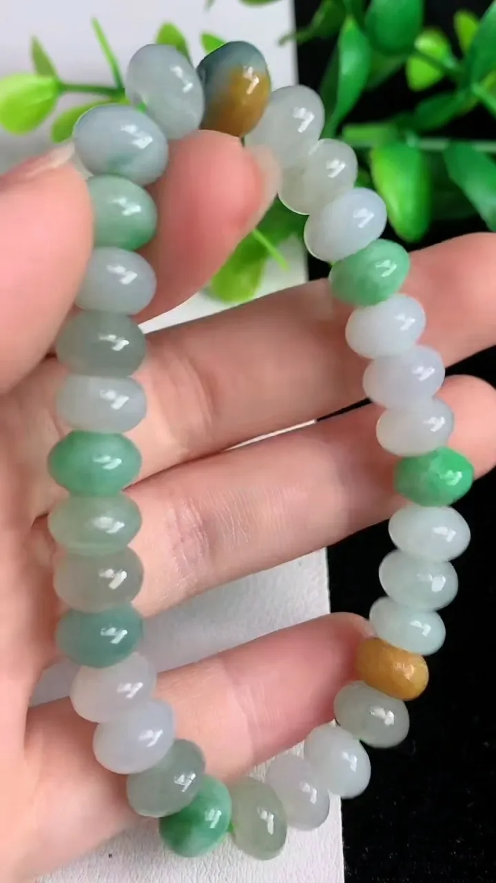 天然A货翡翠货双彩算盘珠手串，尺寸 8.9-5.6-31 颗，重:27.88g5月30日
工厂直销收藏佳品,种好水足，色泽均匀，有种有色，上手高大气！
