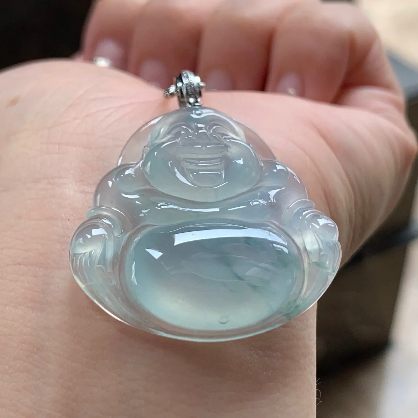 冰种飘花坐佛
清爽 金扣