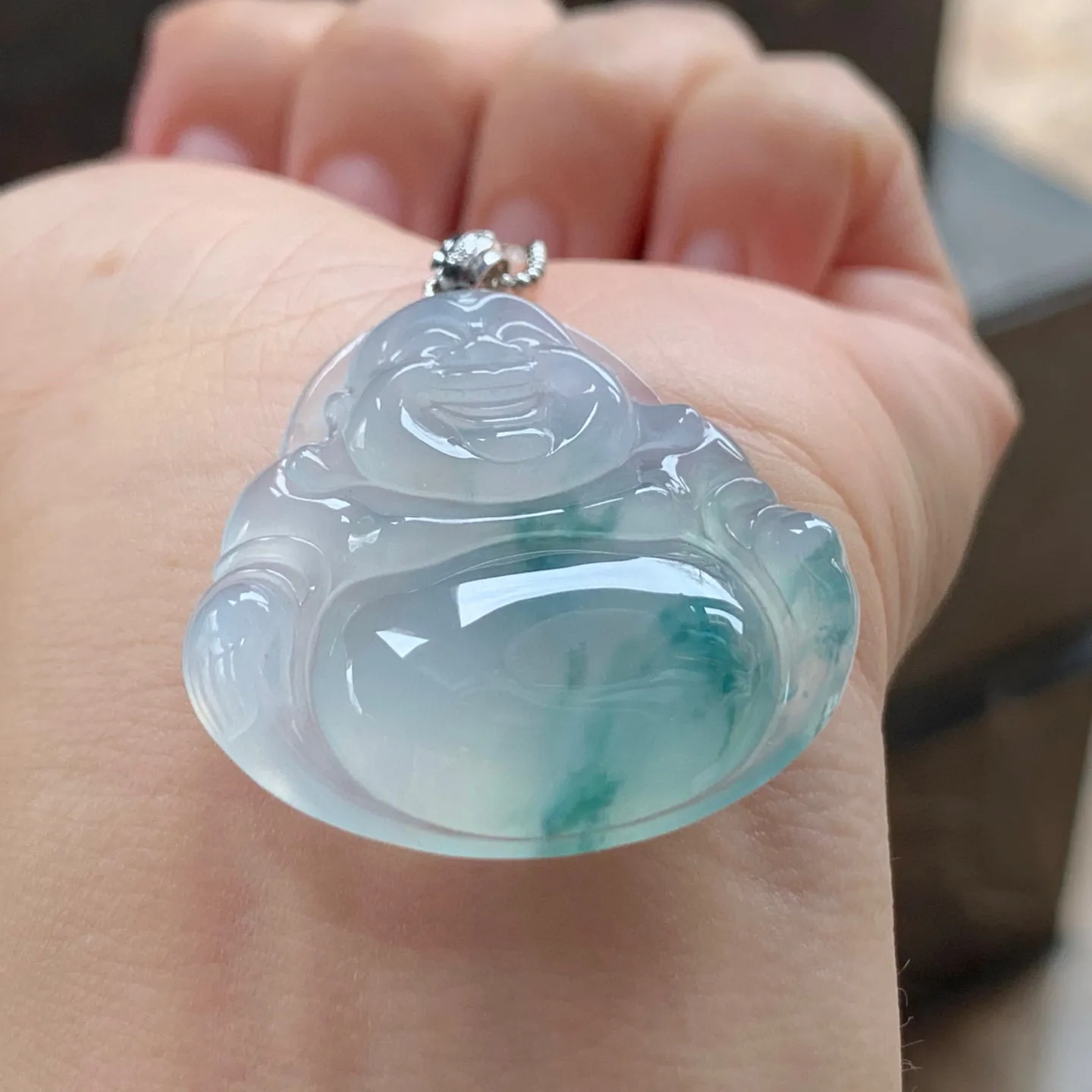 冰种飘花坐佛
清爽 金扣