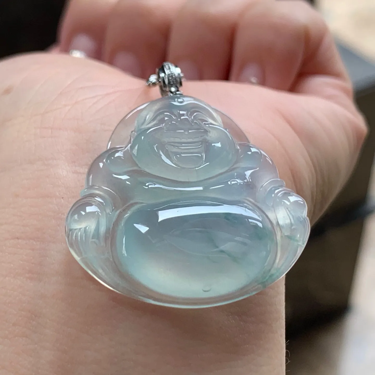冰种飘花坐佛
清爽 金扣