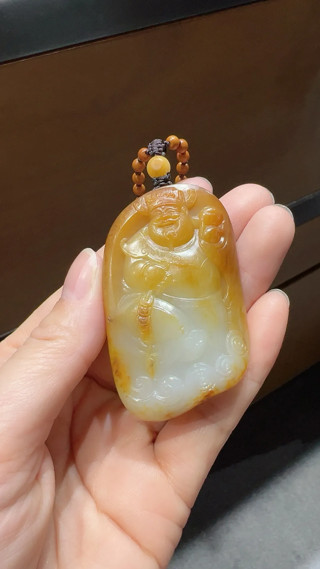 高品质｜籽料红皮财神

重58.4克 尺寸58*35*16.4mm