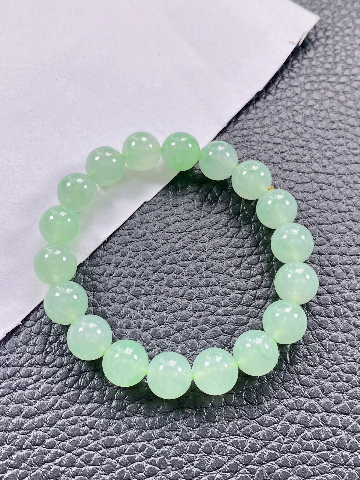 缅甸天然翡翠A货，高冰种起光起胶晴绿底飘阳绿圆珠手串手链，尺寸：11mm/18颗，重量：42.00g