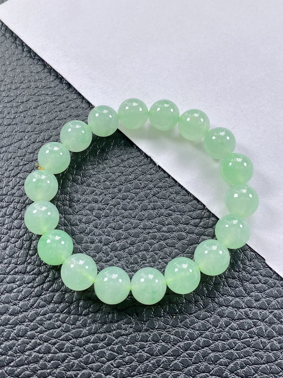 缅甸天然翡翠A货，高冰种起光起胶晴绿底飘阳绿圆珠手串手链，尺寸：11mm/18颗，重量：42.00g