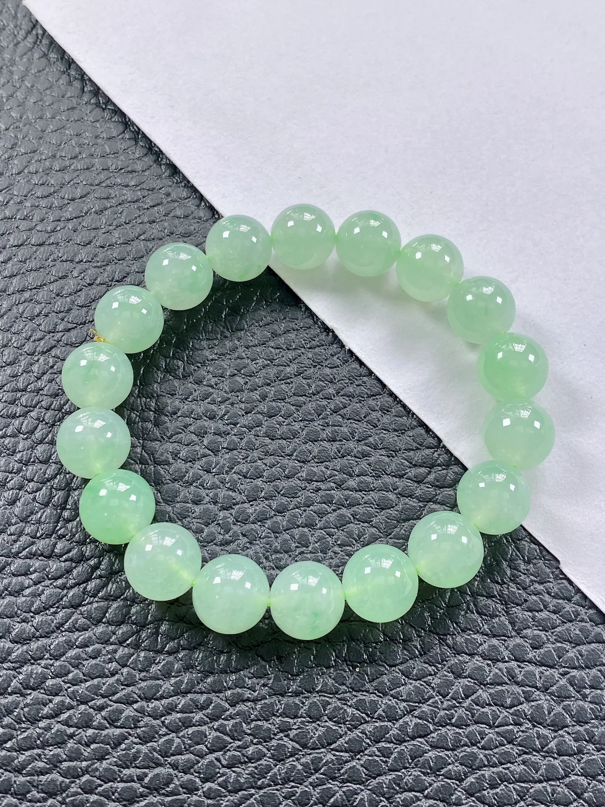 缅甸天然翡翠A货，高冰种起光起胶晴绿底飘阳绿圆珠手串手链，尺寸：11mm/18颗，重量：42.00g