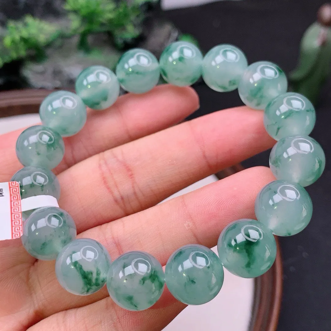 天然A货翡翠冰飘花起胶圆珠手串
尺寸13mm  重59.15g