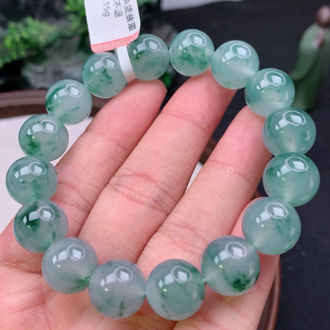 天然A货翡翠冰飘花起胶圆珠手串
尺寸13mm  重59.15g
