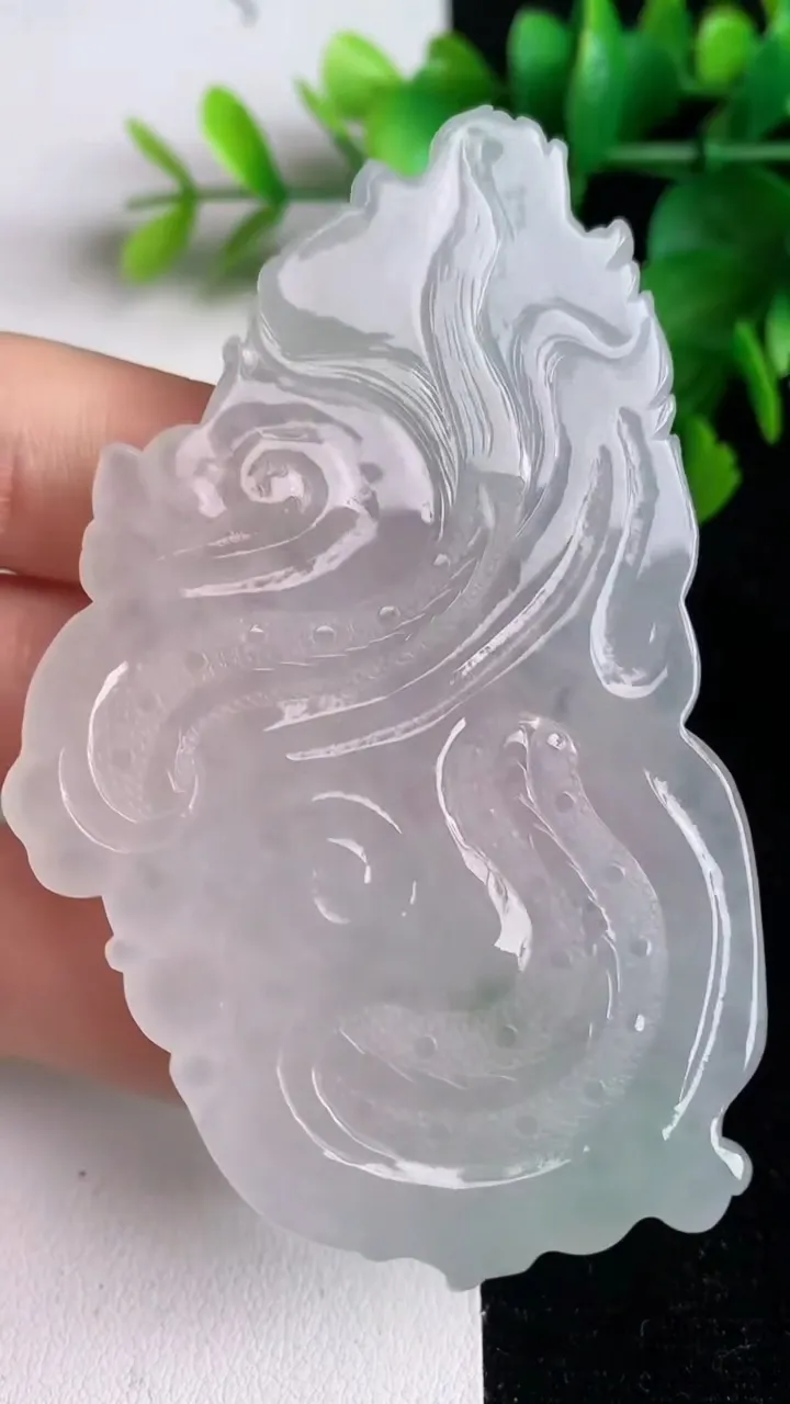 天然A货翡翠飘花不动明王吊坠，尺寸77.5-48.6-5.8，重量:39.22g
6月2日