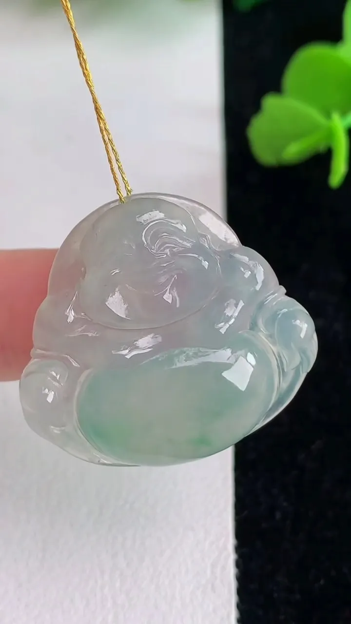 天然A货翡翠飘花佛公吊坠，尺寸26.4-28.3-4.8，重量:5.74g
6月2日