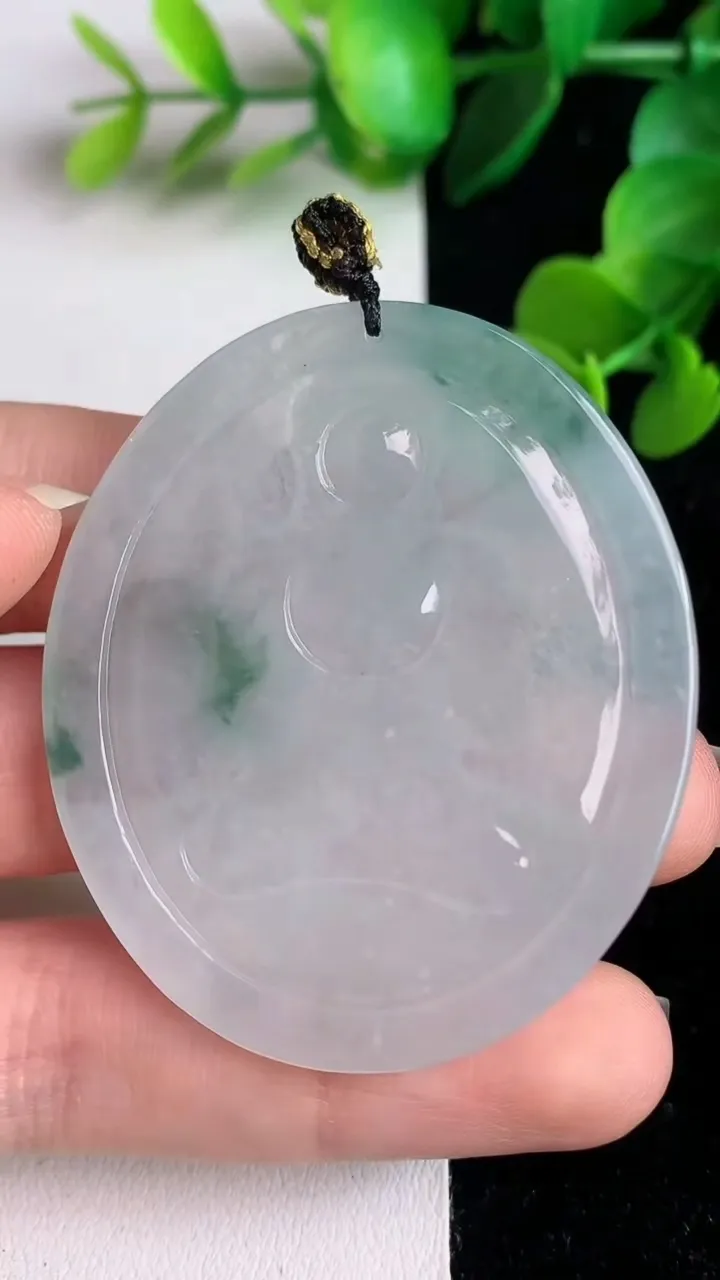 天然A货翡翠飘花阿尼陀佛吊坠，尺寸50.5-42.3-4.6，重量:21.96g
6月2日