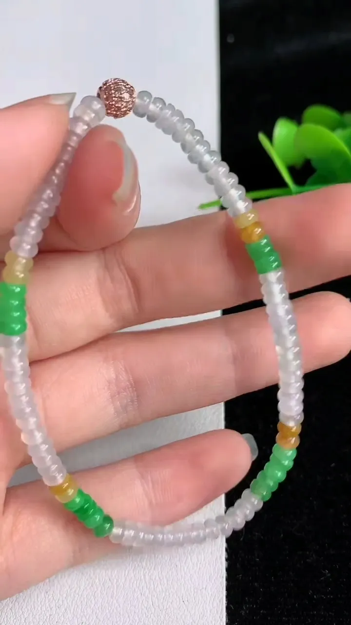 天然A货翡翠货双彩算盘珠手串，尺寸3.4-2-101颗，重量:5.34g6月3日
工厂直销收藏佳品,