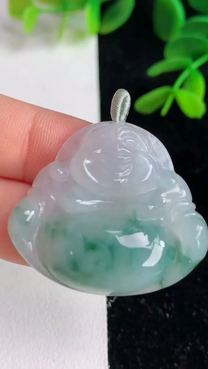 天然A货翡翠飘花佛公吊坠 ，尺寸31.7-35-7，重量:11.85g
6月9日