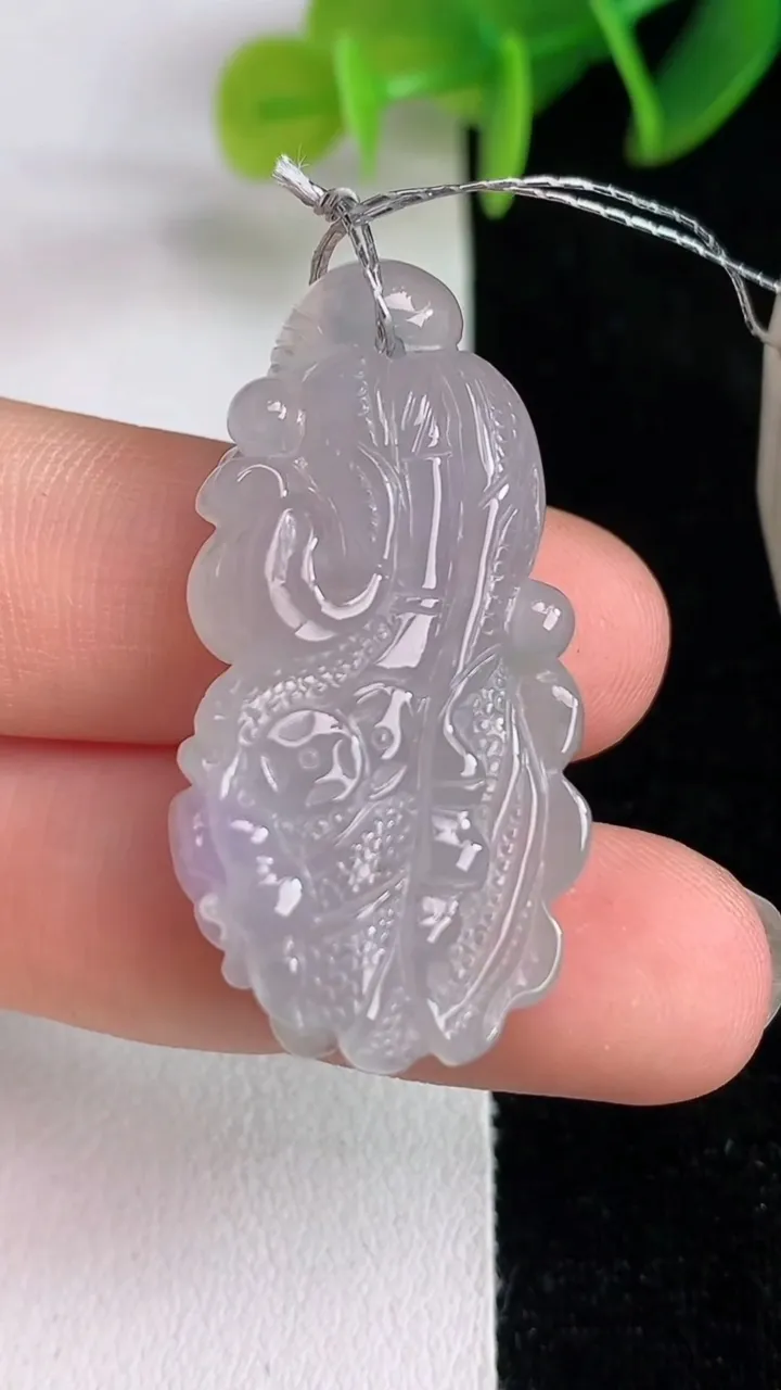 天然A货翡翠紫罗兰白菜吊坠，尺寸36.4-18.6-9.5，重量:10.57g
6月14日