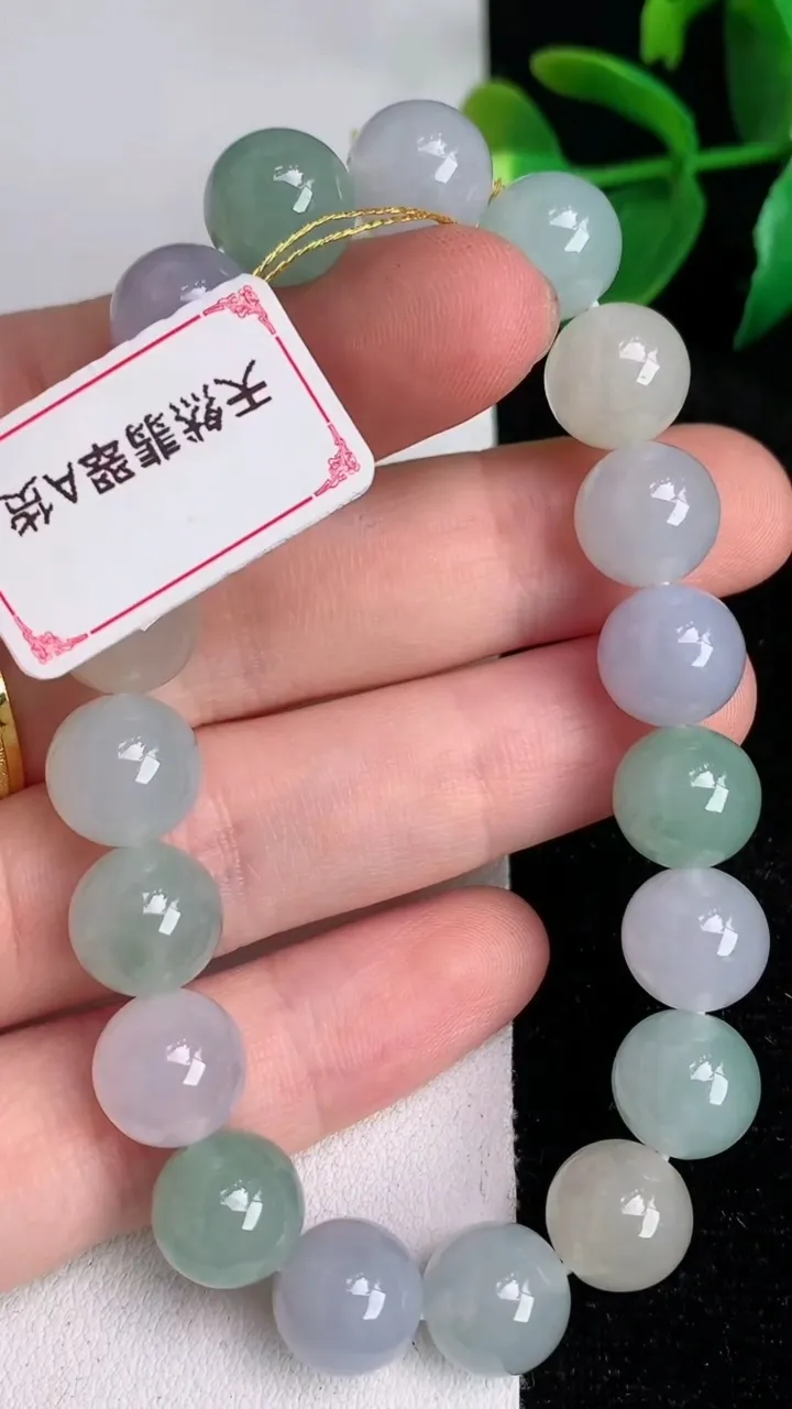 天然A货翡翠双彩马卡龙 多宝圆珠手串19颗，尺寸9.7，重量:32.29g6月17日
工厂直销收藏佳品,种好水足，色泽均匀，有种有色，上手高大气！