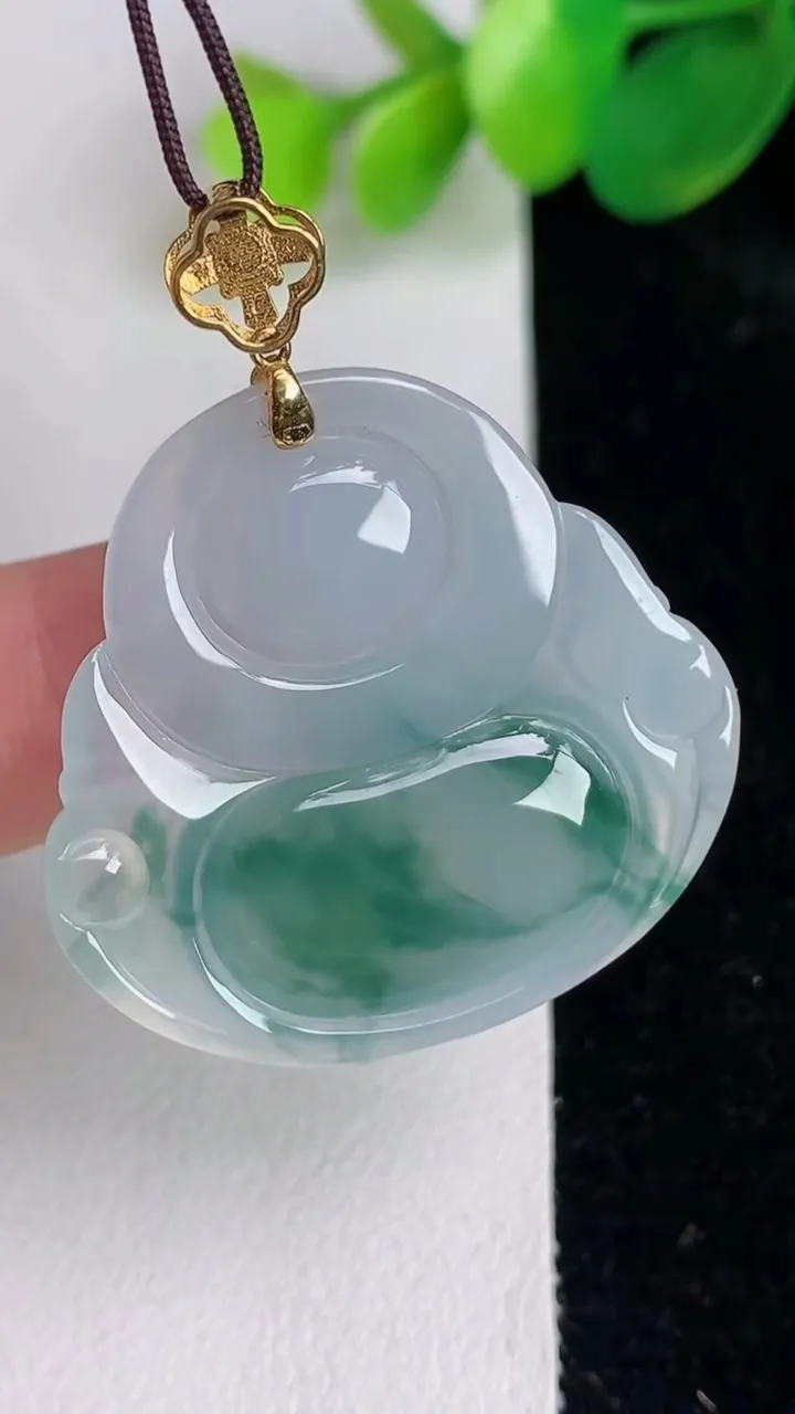 天然A货翡翠种飘花佛公吊坠，尺寸30.8-32.6-6，重量:9.66g
6月17日