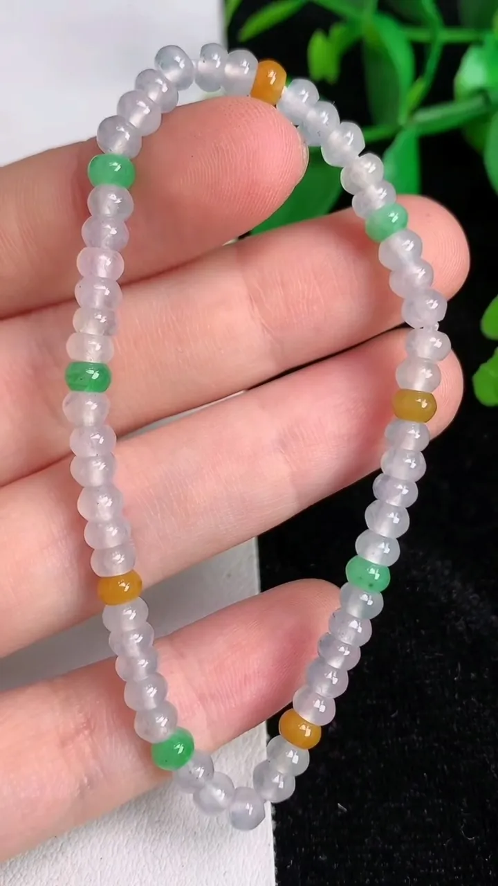 天然A货翡翠种双彩算盘珠手串57颗，尺寸4.2-2.2，重量:6.94g6月17日
工厂直销收藏佳品,种好水足，色泽均匀，有种有色，上手高大气！