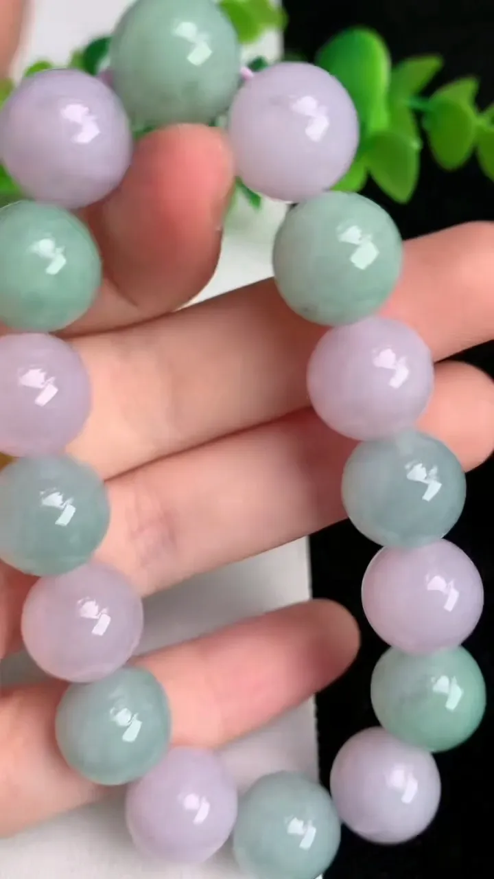 天然A货翡翠双彩多宝圆珠手串16颗，尺寸13，重:56.18g6月18日
工厂直销收藏佳品,种好水足，色泽均匀，有种有色，上手高大气！